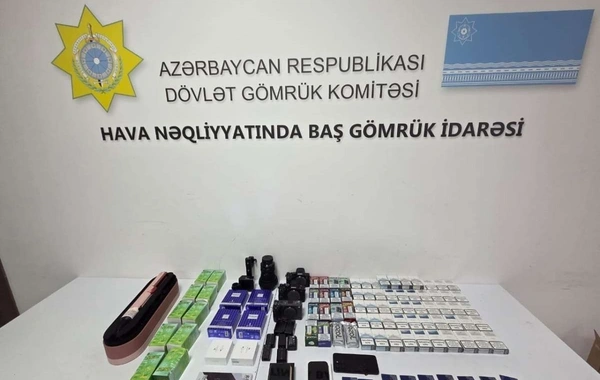 Mobil telefonda və ayaqqabılarda gizlədilmiş qızıl külçələr aşkarlandı