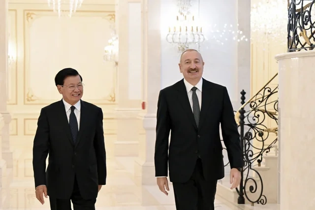 İlham Əliyevin adından Laos prezidentinin şərəfinə rəsmi nahar verilib - Foto