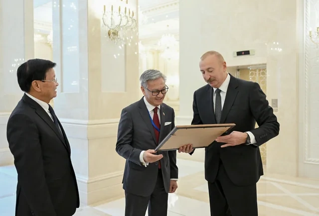 İlham Əliyevin adından Laos prezidentinin şərəfinə rəsmi nahar verilib - Foto