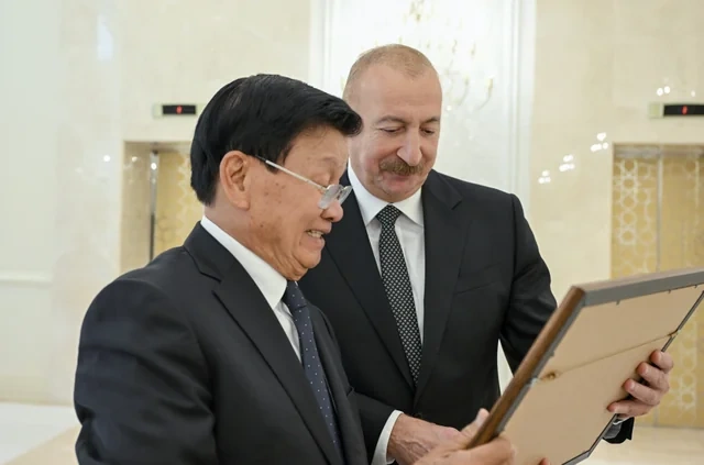 İlham Əliyevin adından Laos prezidentinin şərəfinə rəsmi nahar verilib - Foto
