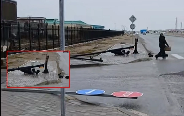 Güclü külək Lökbatanda yol nişanlarını aşırıb