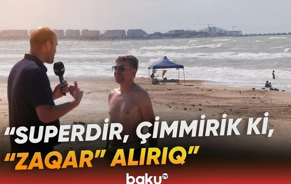 Küləkli havada özlərini riskə atanlar danışdılar: "Bir balaca irəli getsən, dəniz aparar" - VİDEO