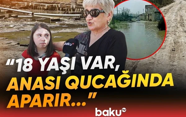 "Dəmir yolu" küçəsindəki çətinliklər: "18 yaşı var, anası qucağında aparır" - VİDEO