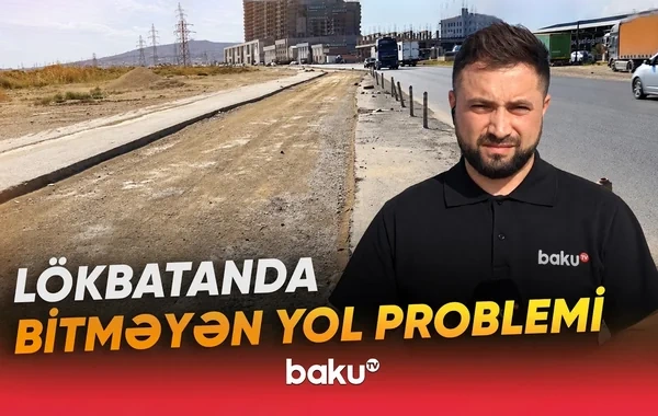 Qəsəbənin girişində "yoxa çıxan" yol - VİDEO