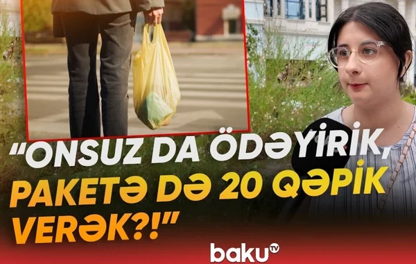 Müştəri "gəzən reklam"a dönür? - VİDEO