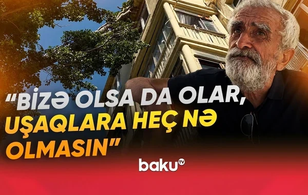 "Yarım saatlıq işdir, amma gəlib görən yoxdur" - Bakıda ağac yaşayış binasının üstünə aşdı - VİDEO